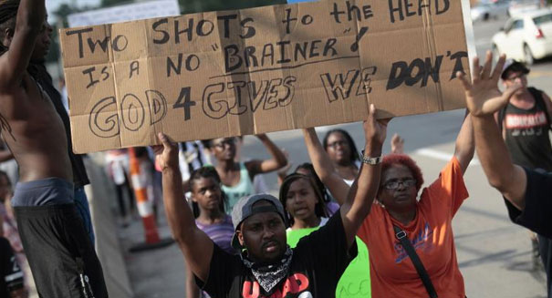 Anger flares up in Ferguson again as 2 arrested in St. Louis during protests