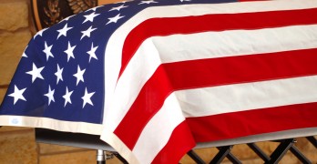 Coffin Draped With The American Flag