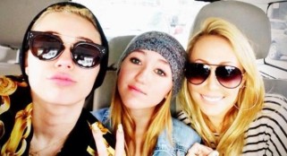 Miley Cyrus posts a photo of ‘the baddest b---hes in the world’