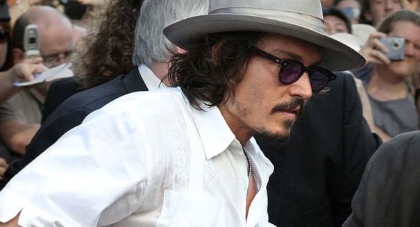 Johnny Depp claims he missed press conference due to chupacabra attack