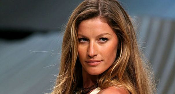 Gisele Bundchen flaunts post-baby body in black string bikini