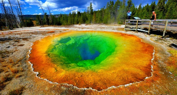 Yellowstone’s rainbow-colored geothermal pools are filled with trash