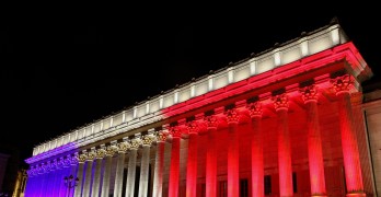 Lyon, France - July 15, 2016: French national colors on the courthouse called palais de justice in French in tribute to all victims of terror in Nice, France